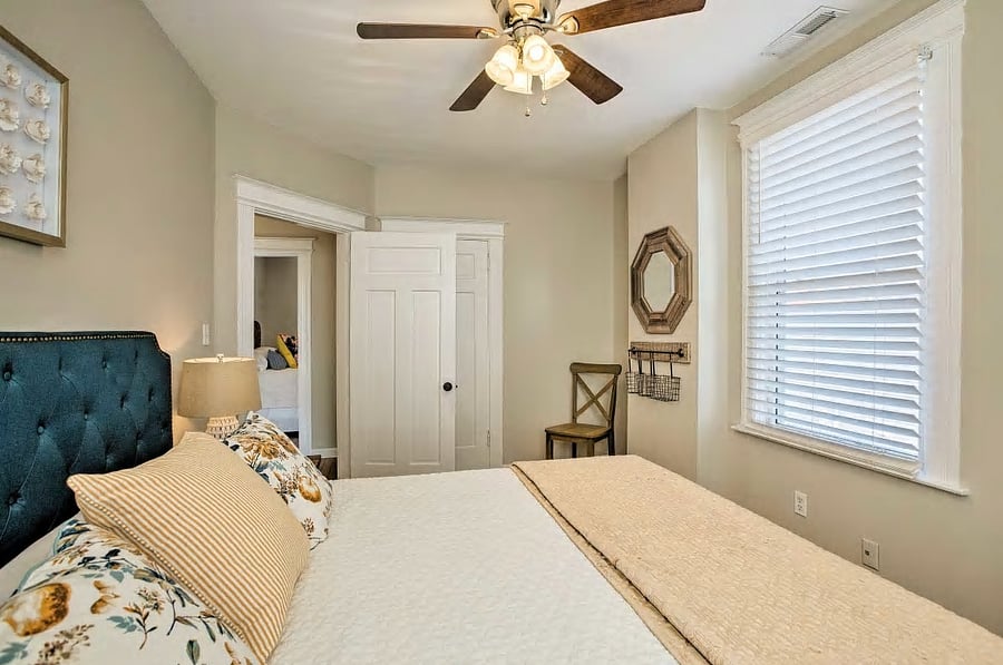 Bedroom 1 on second floor with king bed and closet.
