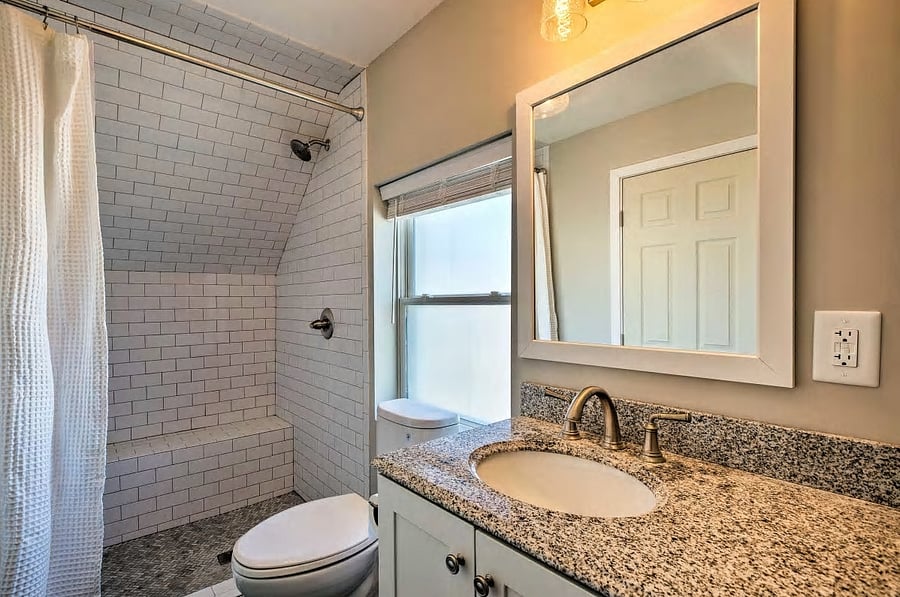 Full bathroom on suite to bedroom 4 with large walk in shower.