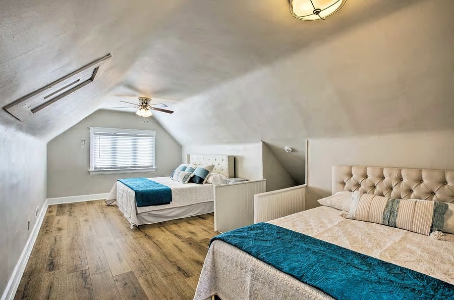 Bedroom 4 with two queen beds on third. Bathroom on suite.