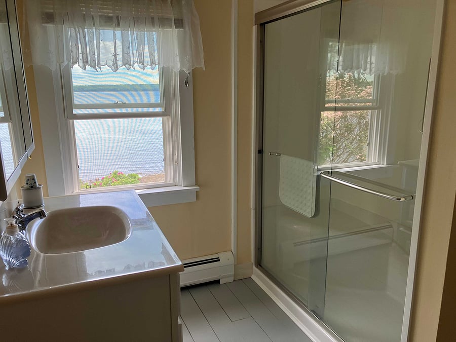 Primary bath showing walk-in shower.