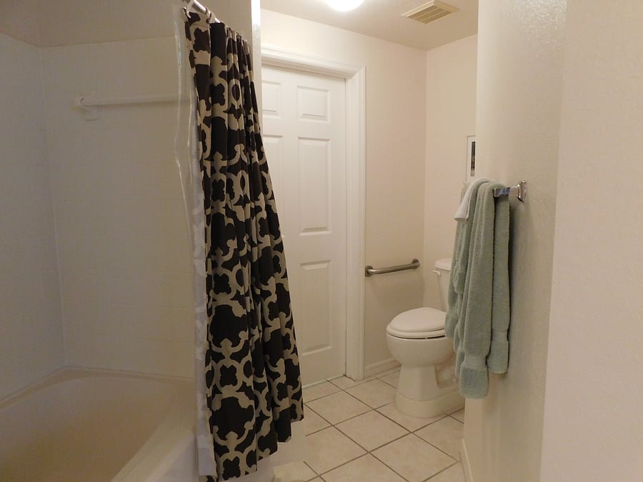 Guest bath has tub/shower combination