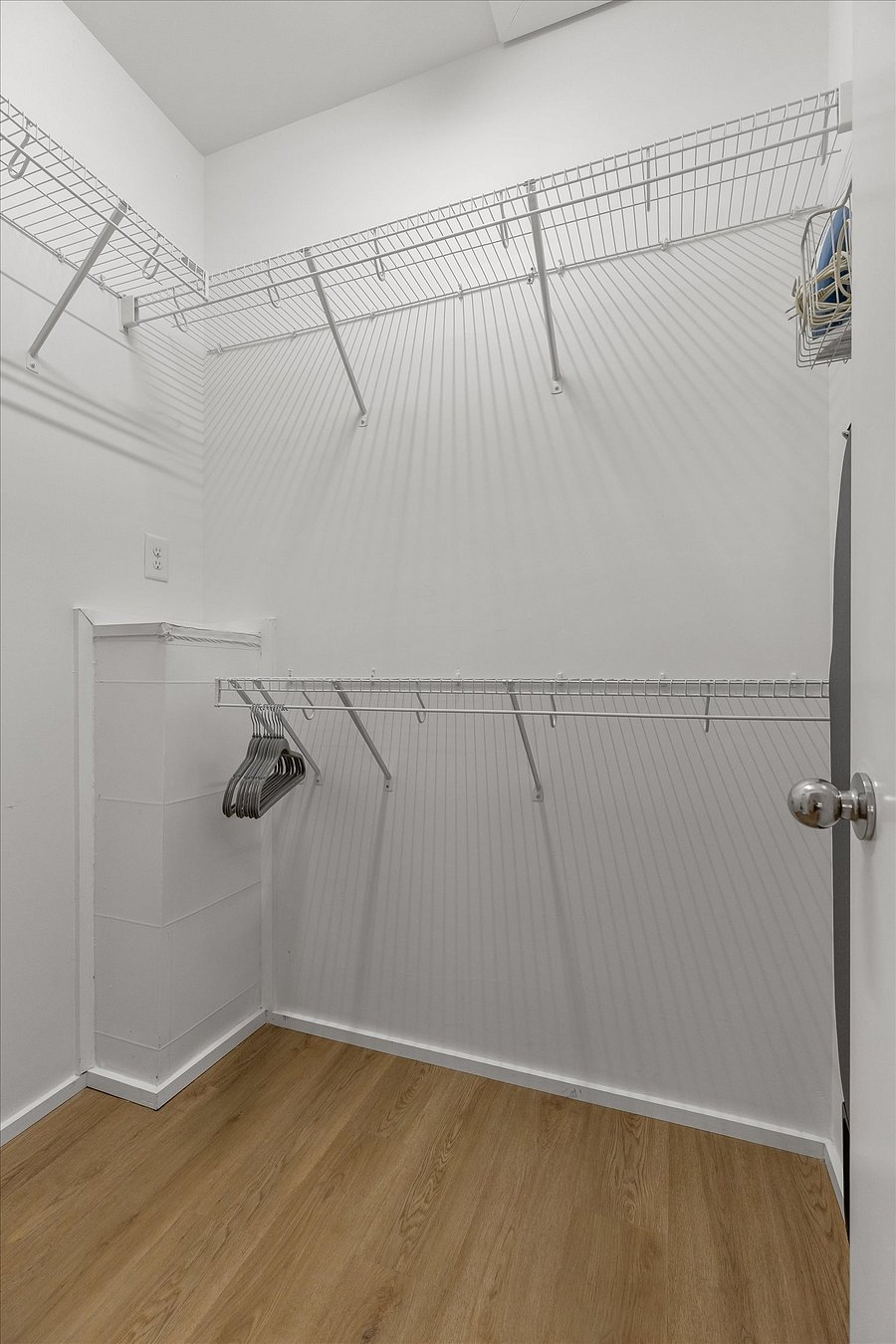Walk-in closet in Primary Bedroom.