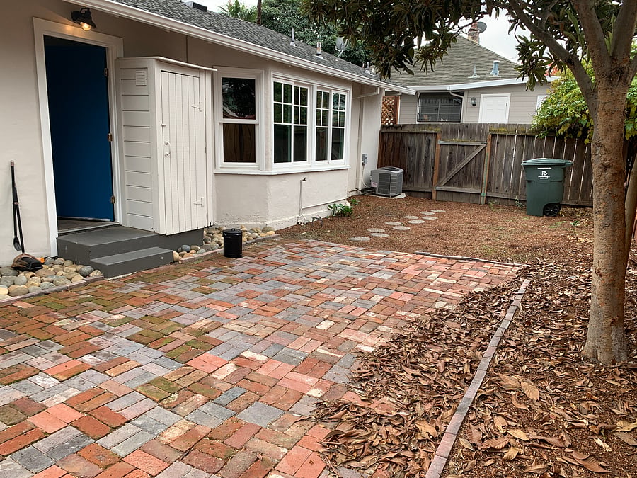 Back yard (we also have a small coffee table and chairs here now not captured in photo)