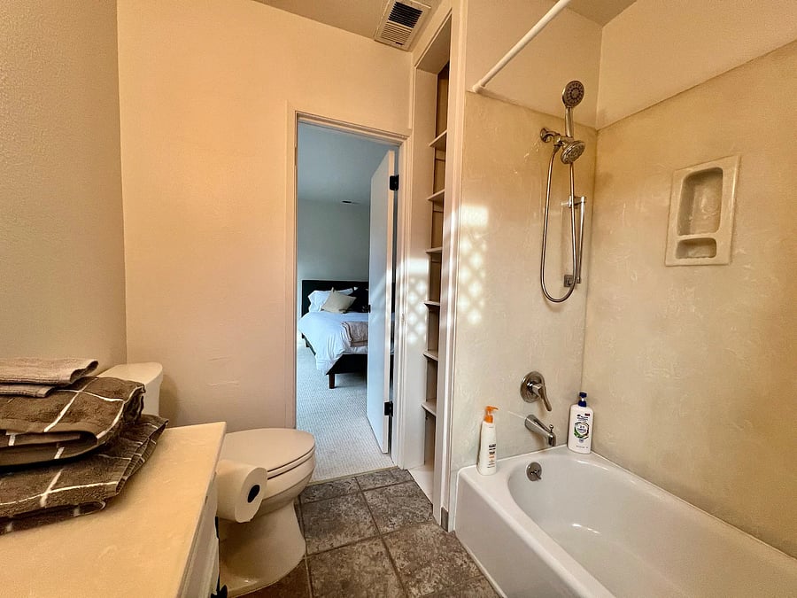 Bathroom with tab, shower, sink, mirror, etc. Also shower curtain (not pictured in photo but is there)
