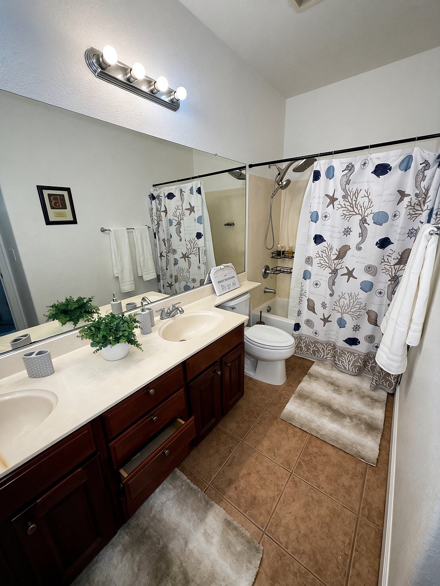 2nd story, shared bath with dual sinks and rainfall shower head