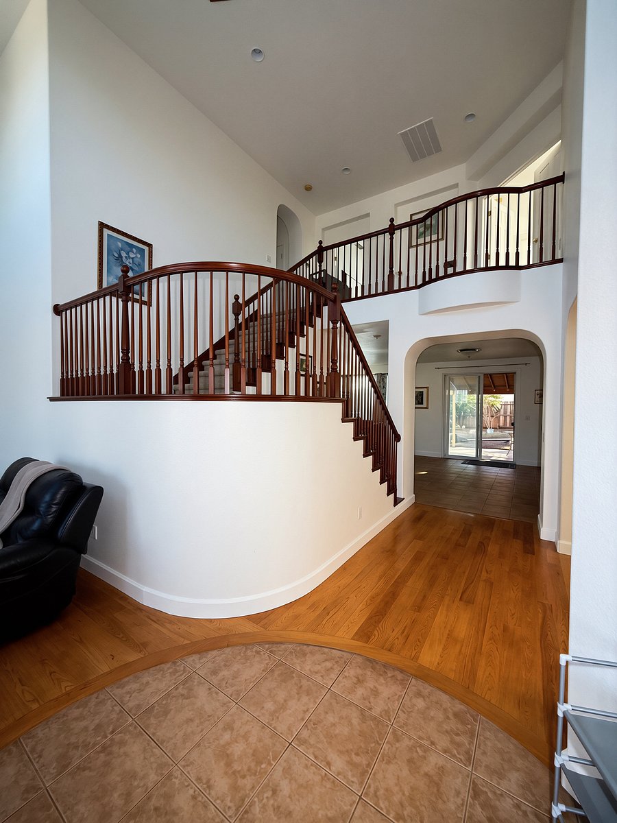 Beautiful staircase as you enter the home