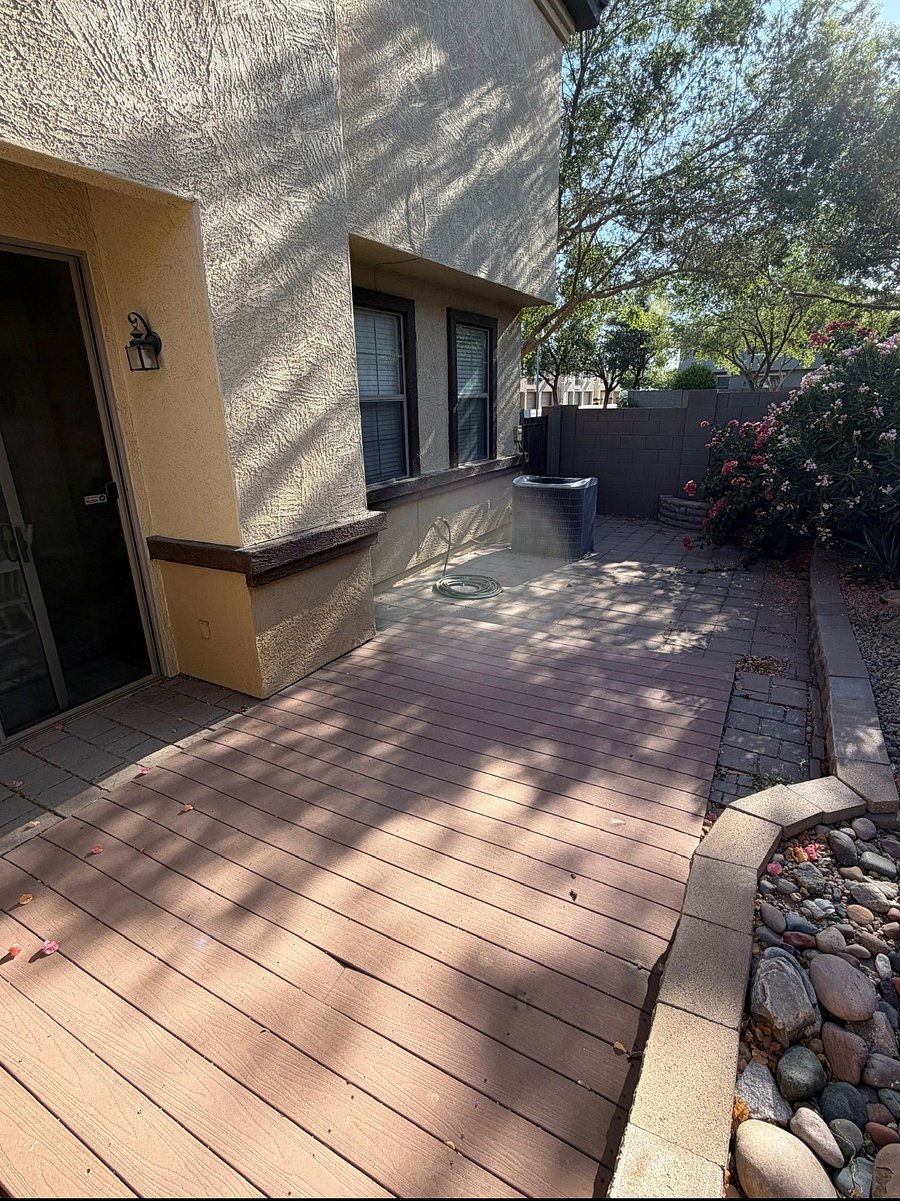fenced back patio area