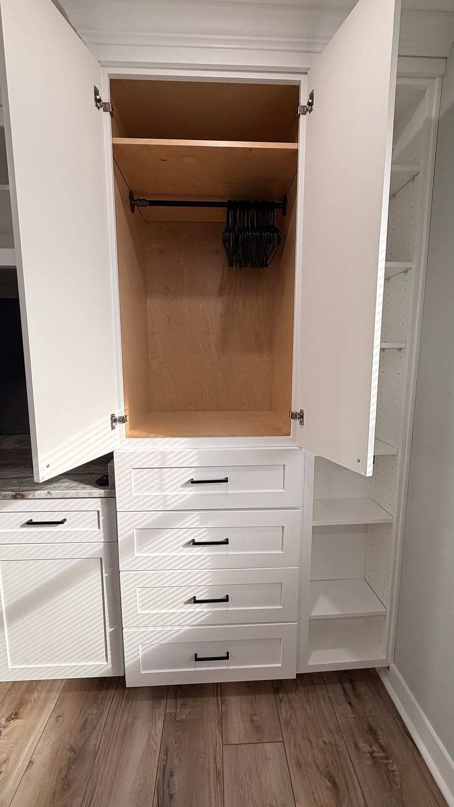 Larger cabinets were intended for hanging wardrobe items. Drawers for the rest.
