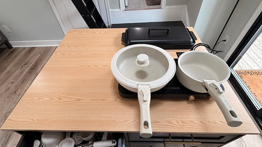 Induction burner does not get hot without the pan. IF you need more than 2 burners I can easily provide another unit. Kitchen comes with full set of pots and pans. Only two are shown here.