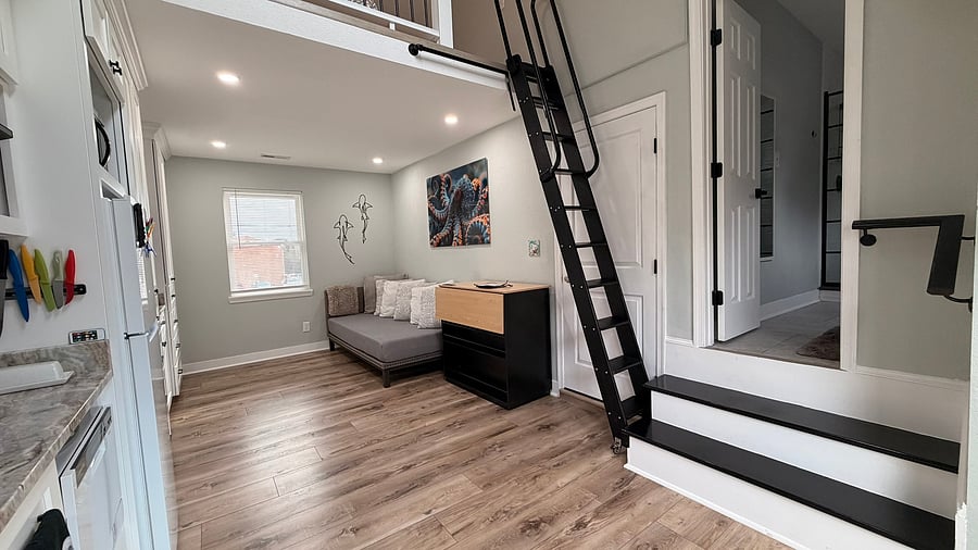 The kitchen island is mobile and can be moved anywhere of convenience to provide additional space when not cooking. My last tenant used it for a workout space.