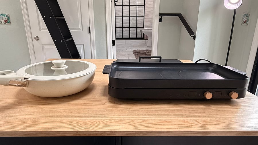 This is an induction burner. You can cook directly in the provided griddle pan, or remove that and use your regular cooking pans. Burner will not get hot until the pan touches the surface.