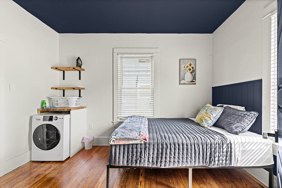 The second bedroom includes the all in one washer/dryer, and has a smaller closet.