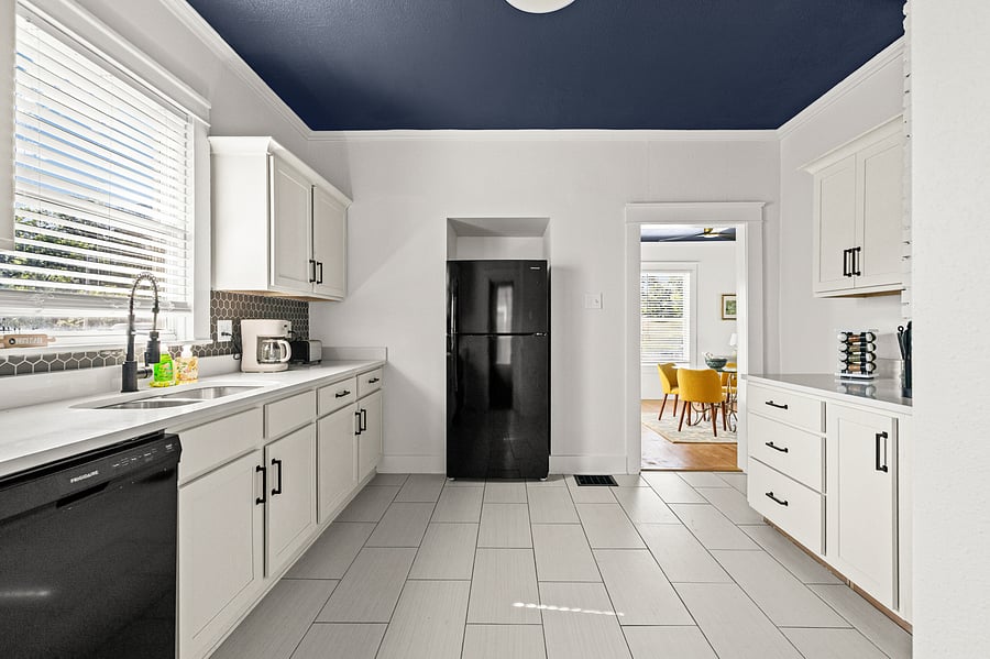 This turn of the century home now has a modern kitchen with solid surface counters, and plenty of cabinet space.