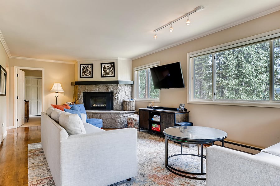 Enjoy Movie Night by the fireplace - Smart TVs throughout the home.