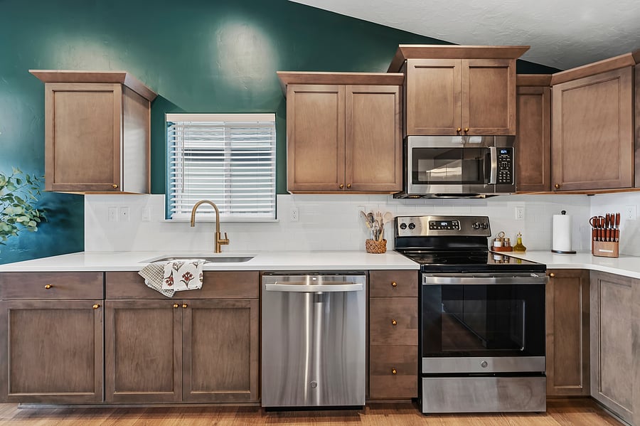 Fully stocked kitchen; coffee pot (k-cups), toaster, baking pans, mixing bowls, hand mixer, knife set, utensils, serving utensils, toxin free pots/pans, wine glasses, wine opener, ice cream scoop & more! Dishwasher, oven and microwave.