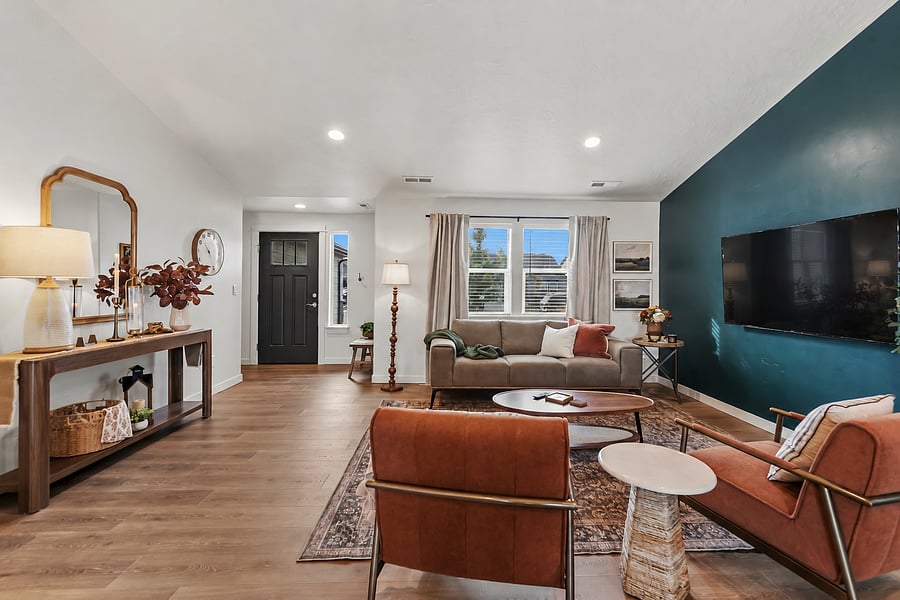 Main living area and entryway. There is an entry bench and hooks available for easy unloading when entering the home.