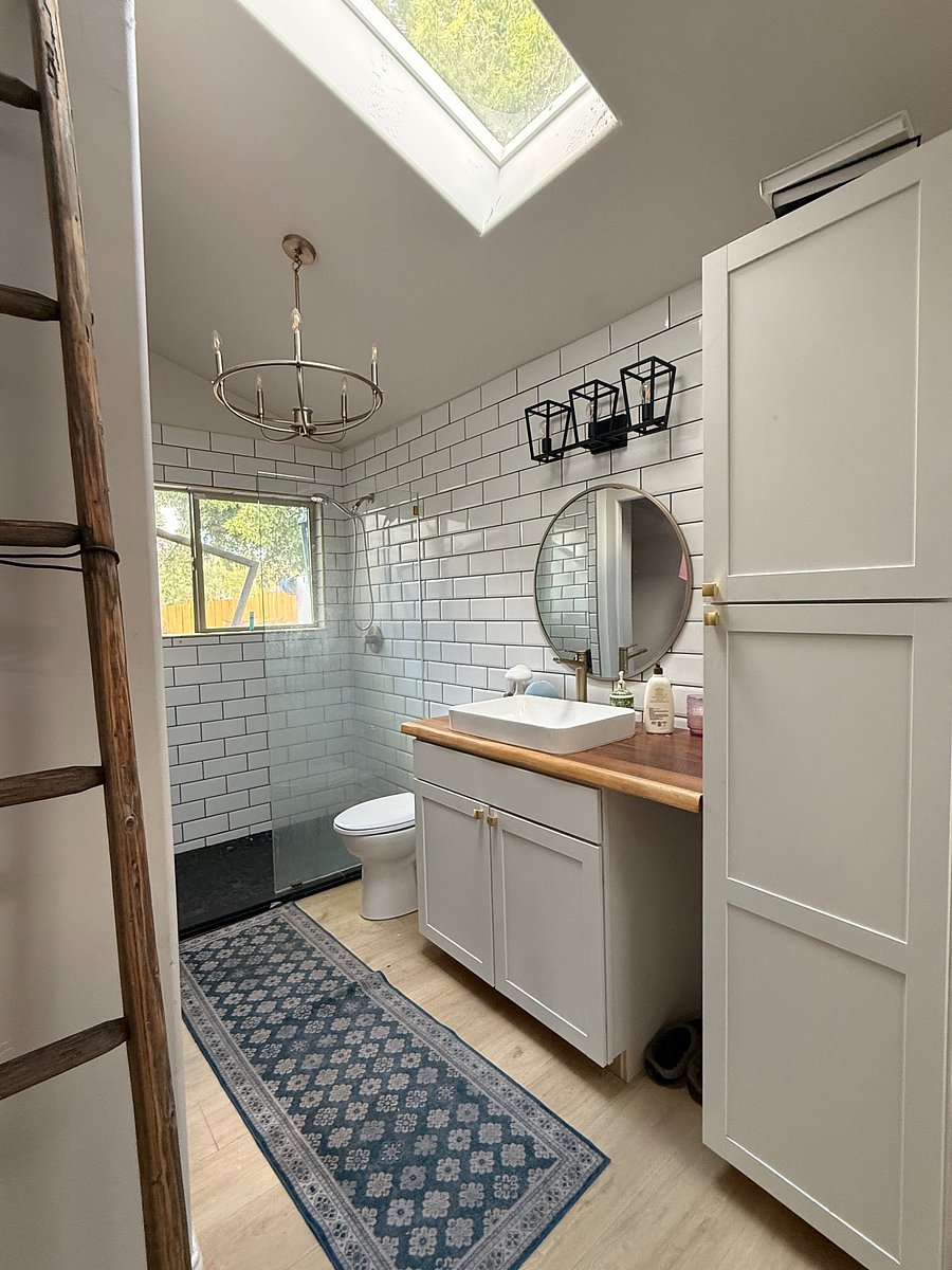 Bath attached to downstairs bedroom with separate entry way