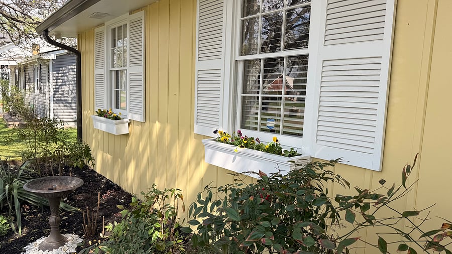 Beautiful custom-made window flower boxes.