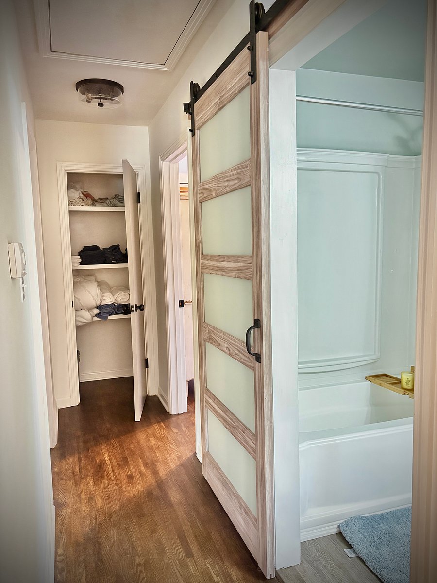 Down Hallway bathroom one and linen closet