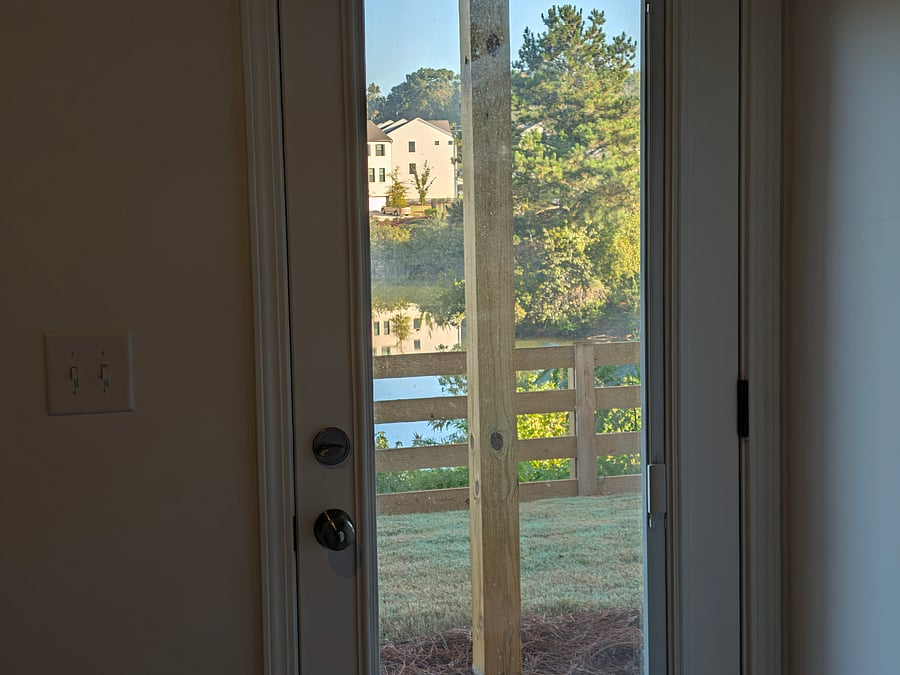 view to lake with blinds open