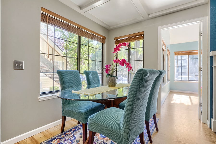Dining Area  A bright, inviting space for 4 guests with everyday meals or entertaining, conveniently positioned between the kitchen and living room.