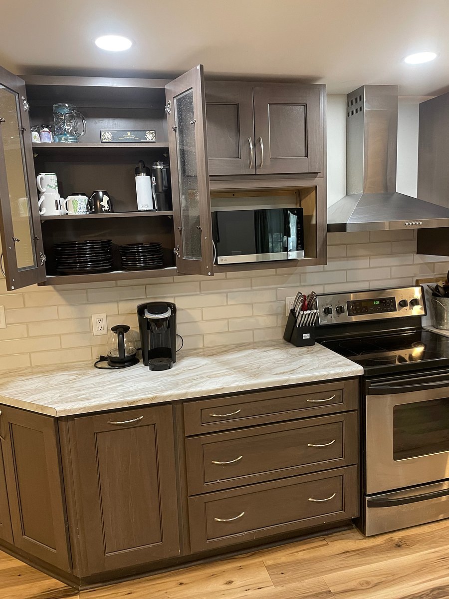 Coffee station and fully stocked cupboards.