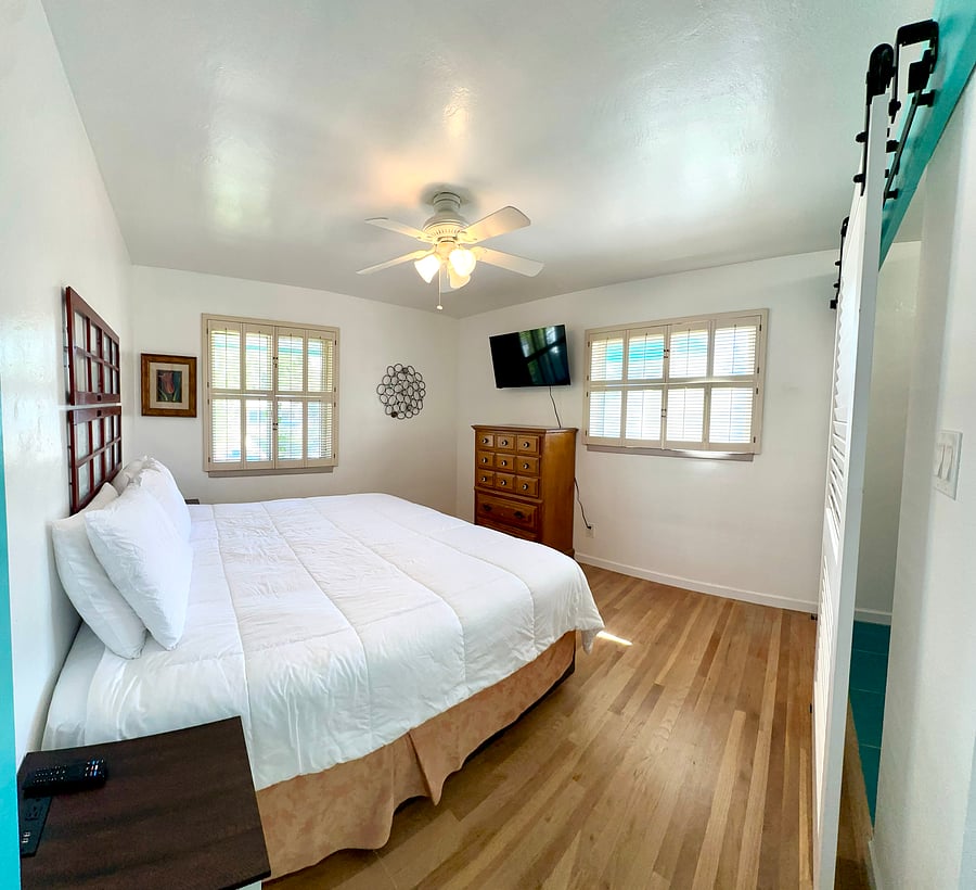 En-suite bedroom with walk-in closet. Shutters on all upstairs windows.