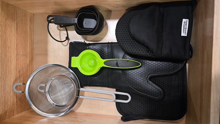 measurement cups, strainers, lime squeezer, gloves