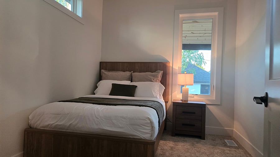 bedroom #2 with one double (full) bed, closet, night stand, lamp with USB charger for your convenience, ceiling fan with remote control.