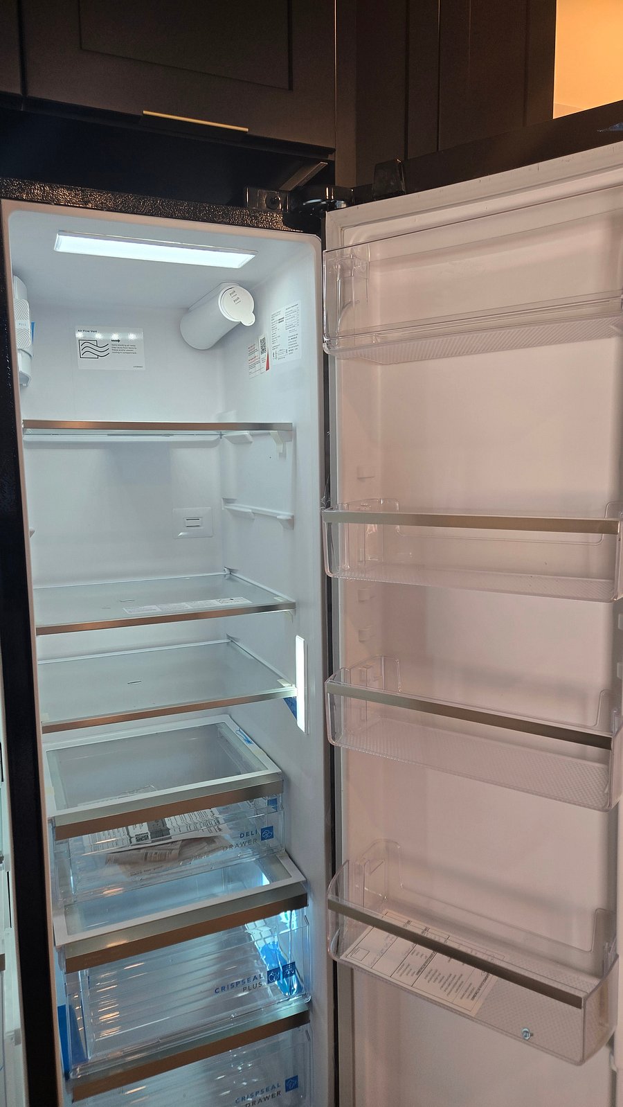 Full size refrigerator with water and ice dispenser