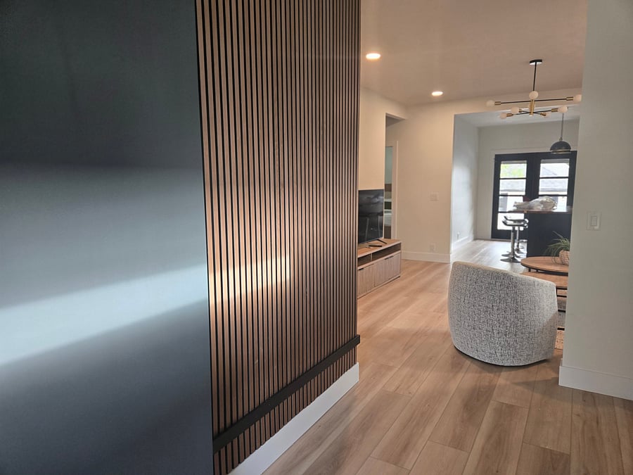 Step from the front deck to this tatesfull decorated hallway entrance.