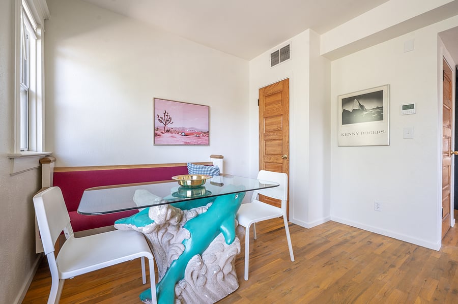 dolphin dining table and church pew banquette