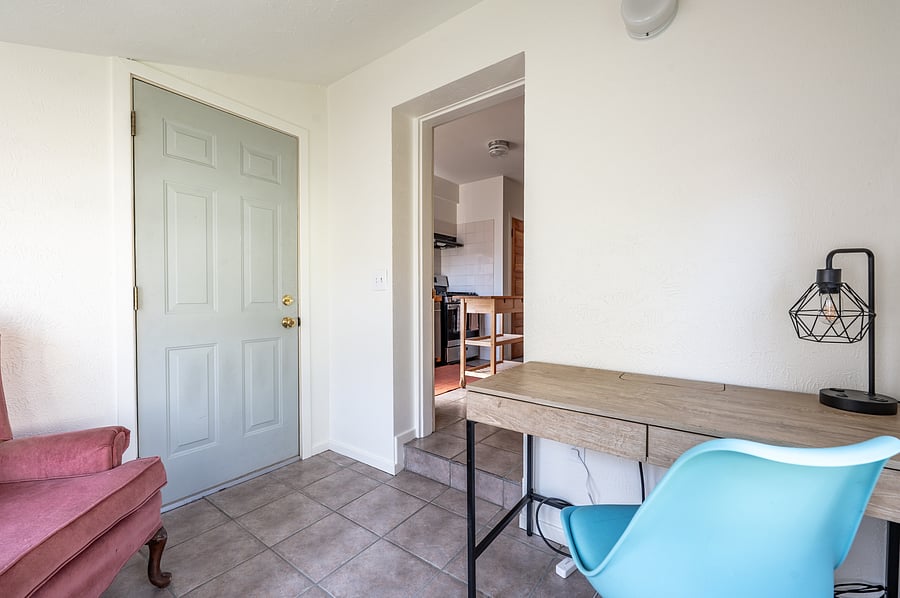 office/sunroom with door to shared balcony