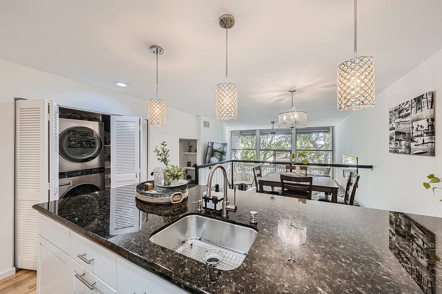 A stacked washer and dryer are conveniently located inside the home, making longer stays especially comfortable.