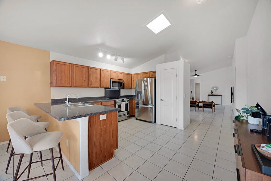 Spacious kitchen with a convenient peninsula, generous preparation space, and everyday essentials for comfortable longer stays.
