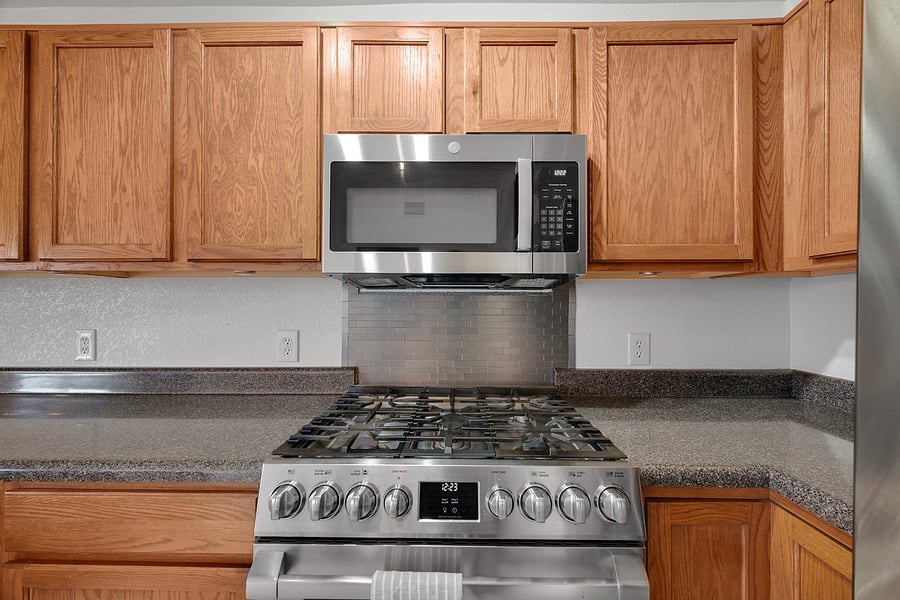 Fully equipped kitchen with major appliances, cookware, dishes, and utensils for preparing meals throughout your stay.