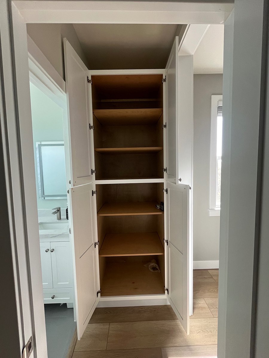 Hallway Closet (next to Bathroom and outside of Bedroom)