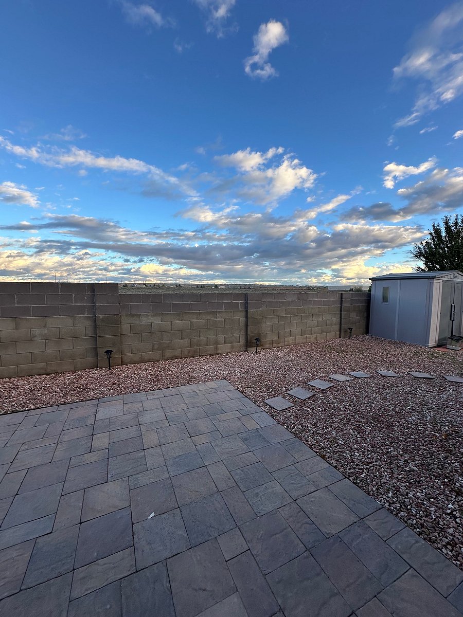 Sunrise in the backyard. Shed is on the right if needed for a bike or extra stuff!