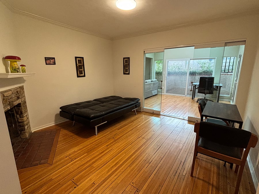 Study/Office/additional bedroom, with a futon and work desk with 2 chair