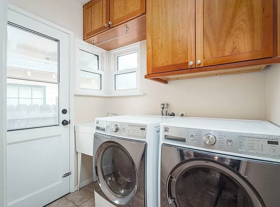 laundry room with a washer and a dryer