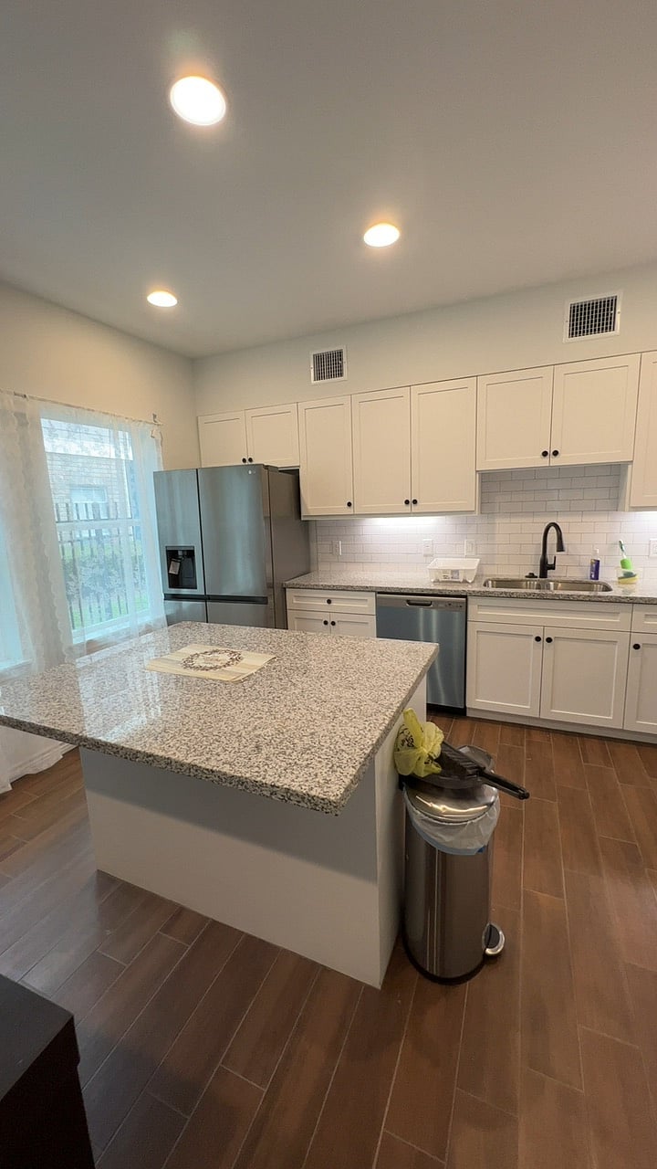 Kitchen overview - Refrigerator, Microwave, Dish washer, Electric range stove and available cabinets