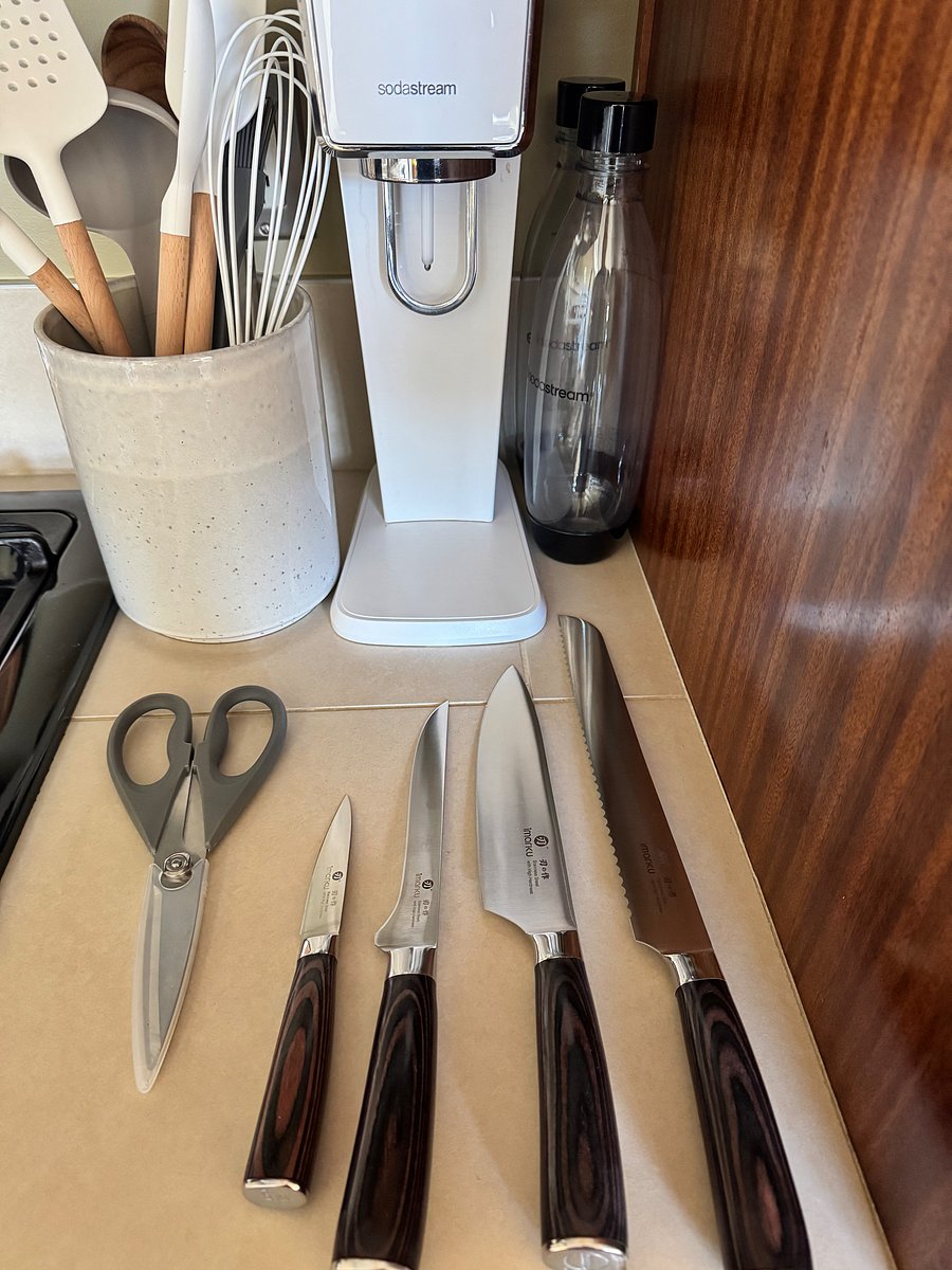 New Sodastream for bubbly water, plus utensils.