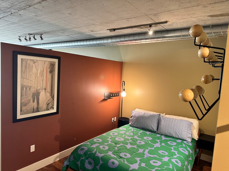 Eames Hang-It-All coat rack in bedroom.