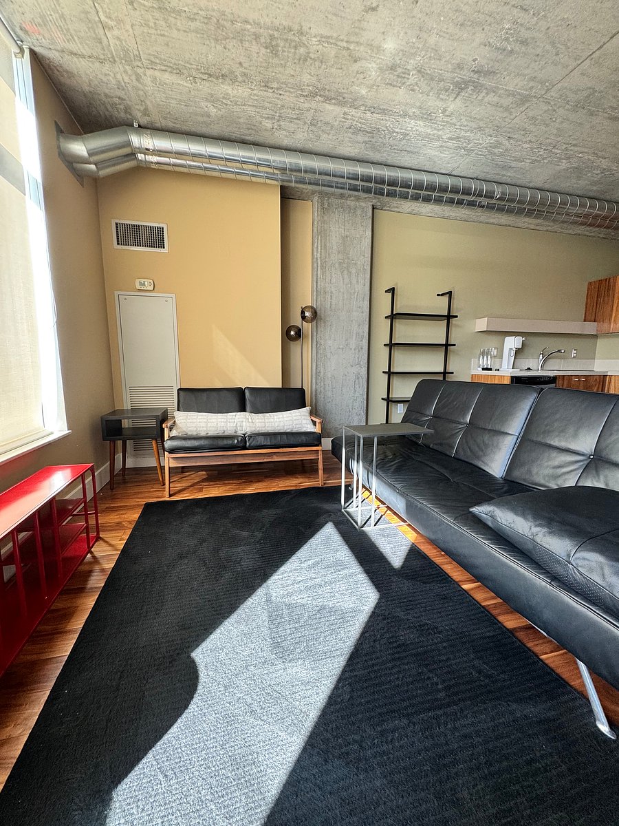 View from front corner of living area. Can be expanded back as well. Heating and AC controls in panel behind couch.