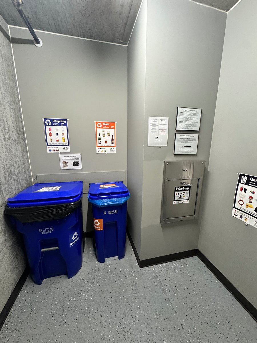 Recycling and 13th floor garbage chute. In exterior hallway.