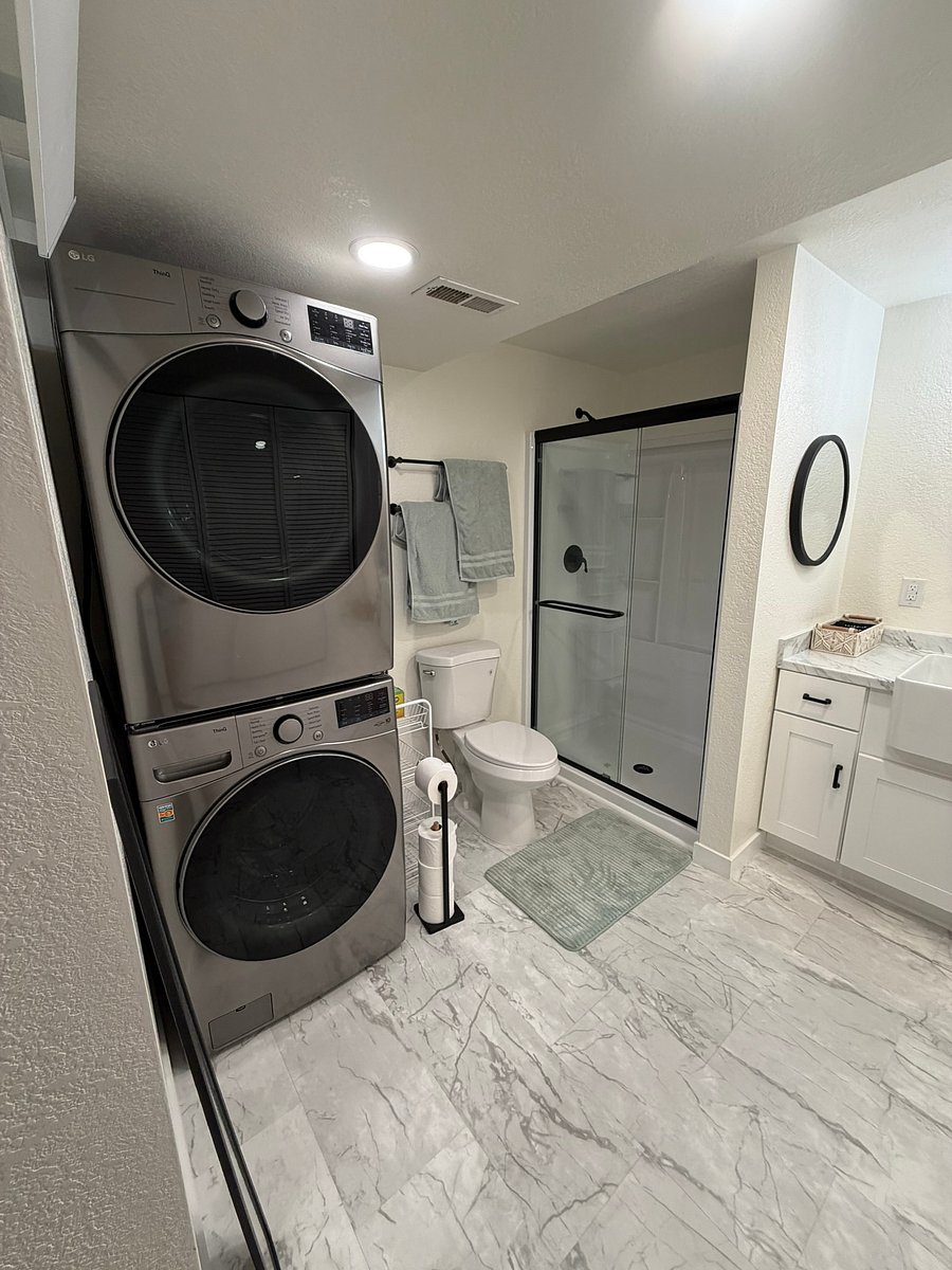 A high-quality washer and dryer, less than a year old and all yours (we do our laundry upstairs)! The bathroom also has a cove heater, so you'll stay warm stepping out of the shower or doing laundry, even on cool days.