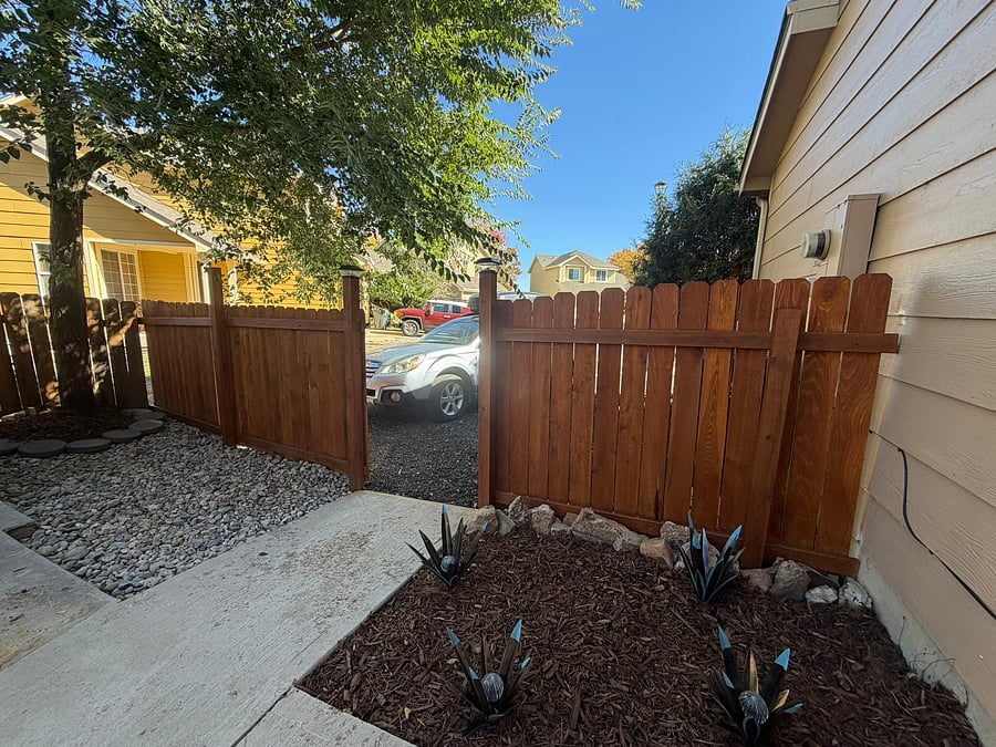 View from your side-door entry with motion sensor light and solar lights on the fence for safe entry and exit during the dark.