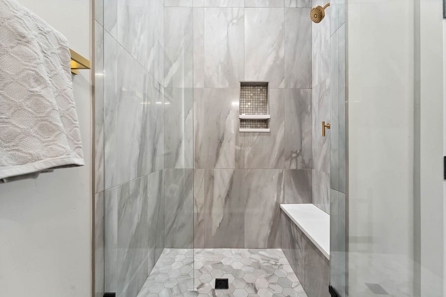 Main floor powder bath. Includes a shower.