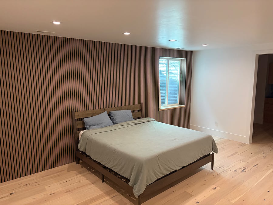 Basement bedroom #1. Includes large walk-in closet and spa style bathroom.