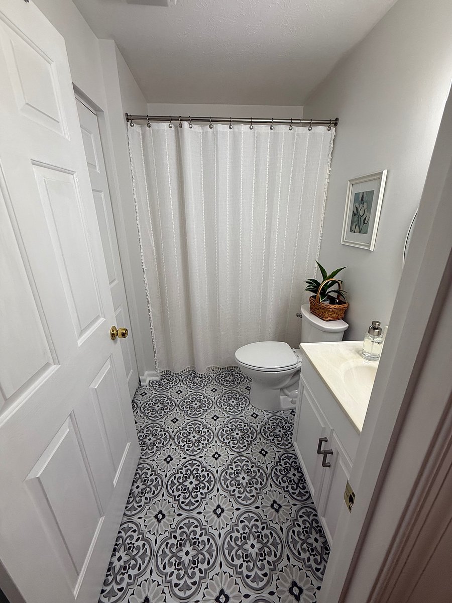 Shared bathroom with laundry